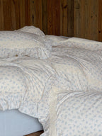 Pomeline Ivory Floral Ruffle Muslin Bedding Set original reference image 1