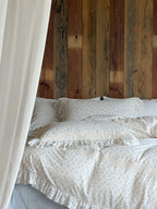 Pomeline Ivory Floral Ruffle Muslin Bedding Set original reference image 2